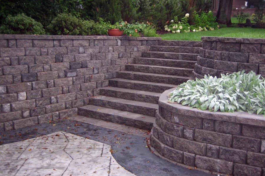 retaining wall with a staircase designed and installed by Omaha, NE's Jay Moore Landscaping